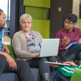 Educators discussing AI policy