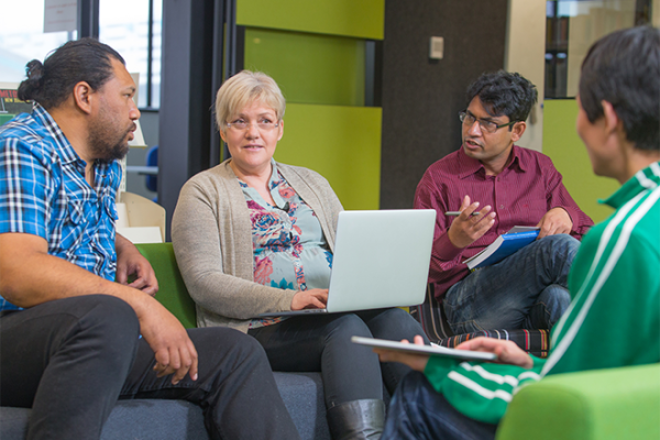 Educators discussing AI policy