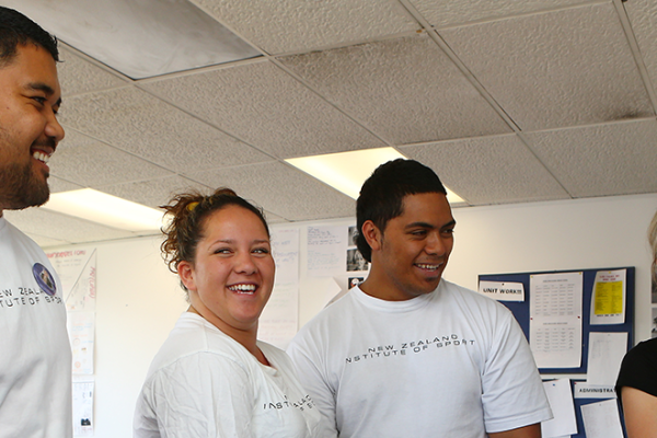 Students making notes at the whiteboard