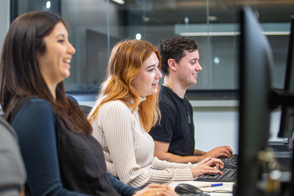 Learners work at their computers