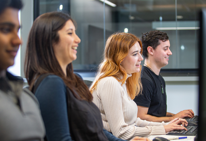 Learners working at their computers