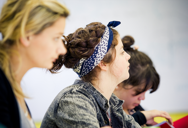 Student paying close attention during a lecture. 