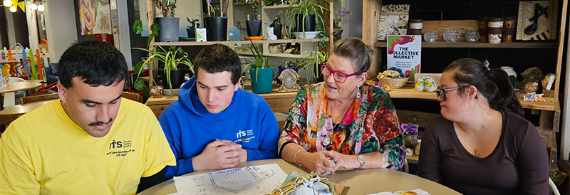 Poppy Clapperton working with NZCSL students