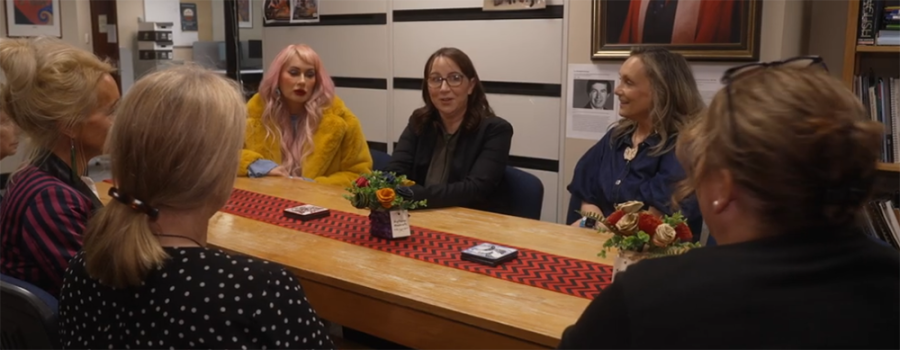 Melissa McLeod (centre) leads a group discussion