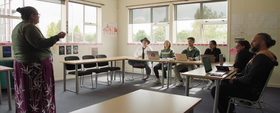Haani Huata-Allen (left) speaks to her students